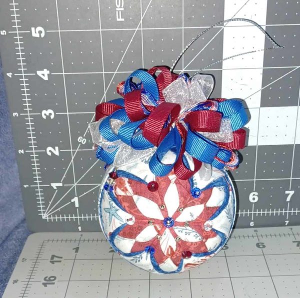 Red, white, and blue themed ball sizing